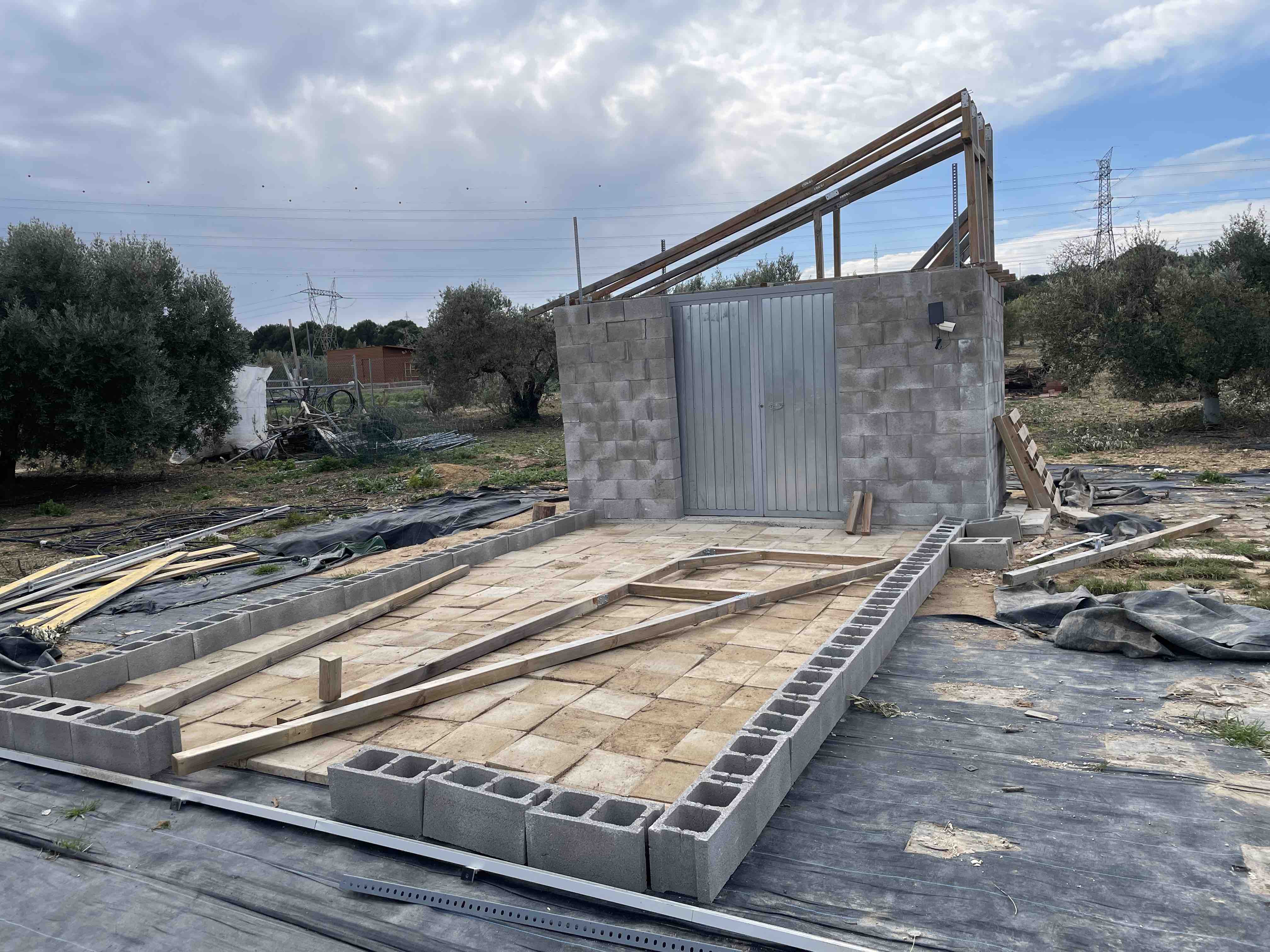 Greenhouse Floor installation, and restructured ends trusses